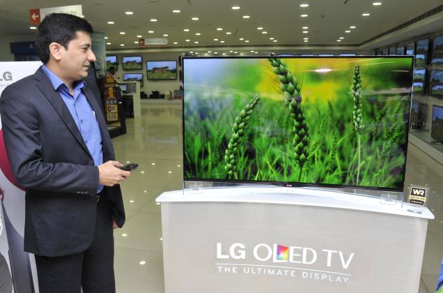 Rajneesh Sharma , Regional Head , LG ( Andhra Pradesh), launching the first LG curved OLED television ( 55EA9800) with a 4.3mm thin curve in Hyderabad on Tuesday ./ Photo: P.V. Sivakumar / The Hindu