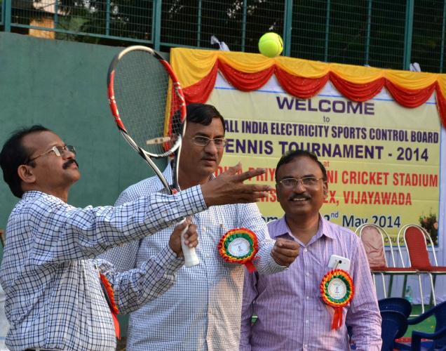 APSPDCL Chief Engineer K. Raja Bapaiah trying his hand at tennis after inaugurating the 39th All India Electricity Sports Control Board’s Tennis Tournament in Vijayawada on Monday. / PHOTO: V. Raju. ./ The Hindu