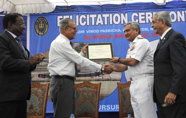 Vice Admiral (retd) Vinod Pasricha receiving 'Individual Achievement Award' of World Ship Trust of UK from Flag Officer Commanding-in-Chief Eastern Naval Command Vice Admiral Satish Soni at a felicitation function organised at INS Kursura Submarine Museum on the Beach Road in Visakhapatnam on Wednesday. Photo:C.V. Subrahmanyam / The Hindu