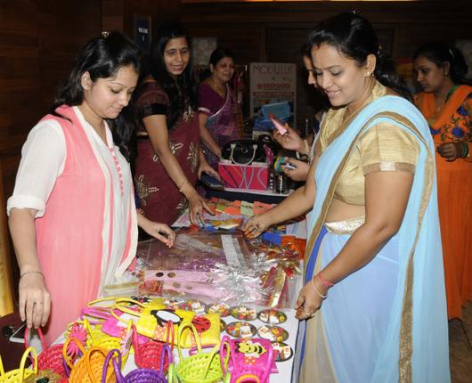Women browsing through handcrafted wares at 'Tambola Mela' organised by Rotary Club Visakhapatnam Central to raise funds for setting up of low cost sanitary napkins unit at Four Points Hotel on Monday in Visakhapatnam. Photo: C.V. Subrahmanyam / The Hindu
