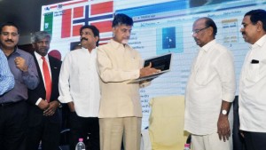 Chief Minister N. Chandrababu Naidu launching the website of the AP Non-Resident Telugu Corporation in Tirupati on Wednesday. Ministers Ganta Srinivasa Rao, B. Gopalakrishna Reddy, and P. Narayana, and TANA members Komati Jayaram and Satish Vemana are seen.—Photo: K.V. Poornachandra Kumar